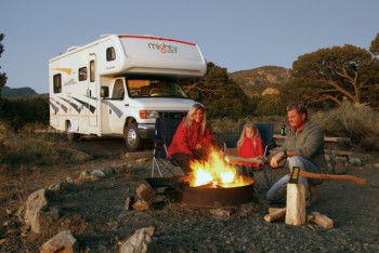 Campfire in front of RV