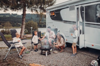 Family in front of RV